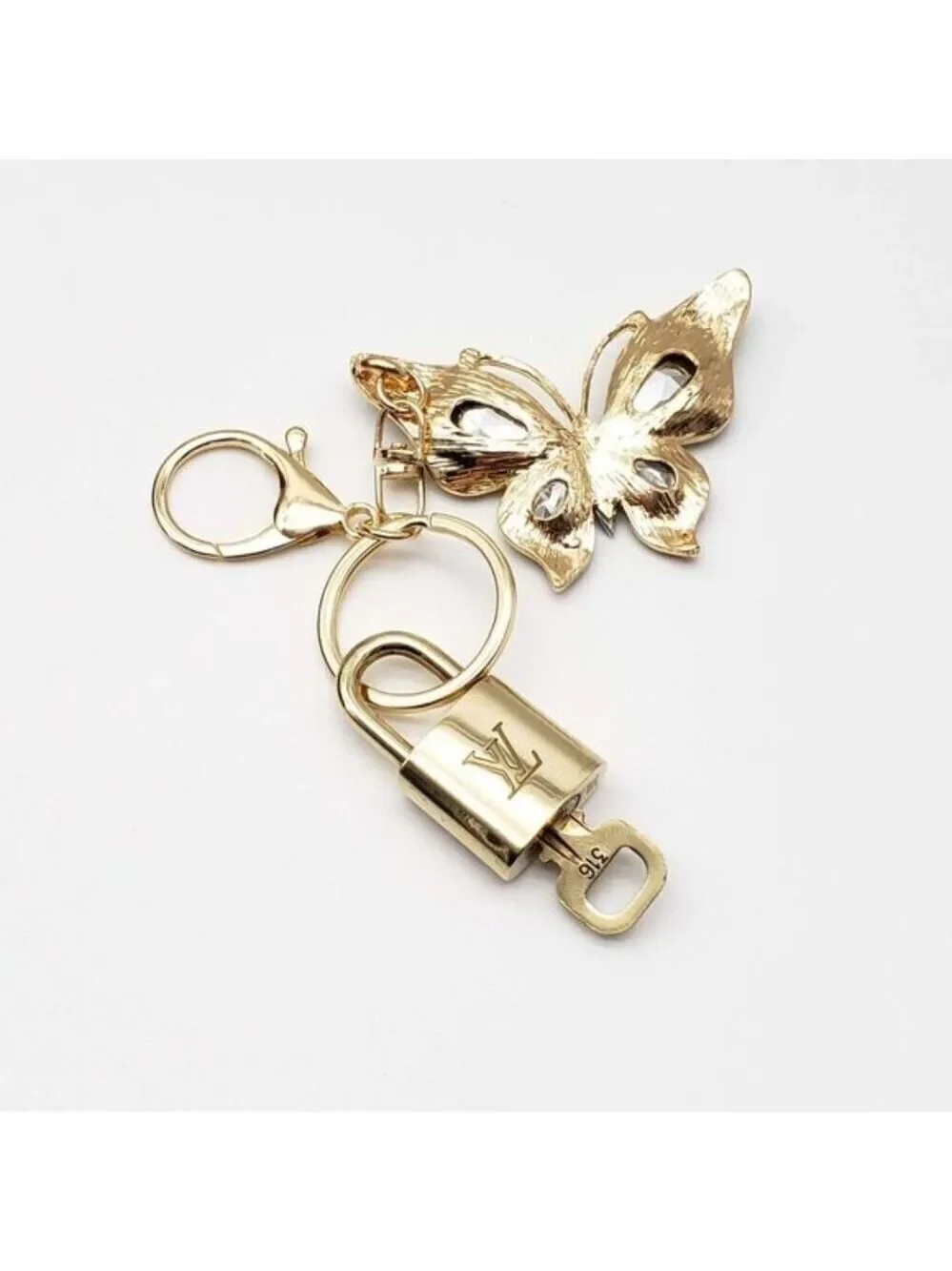 Authentic Louis Vuitton Gold Lock 🔒 Keychain Bag Unbranded Butterfly Charm LV